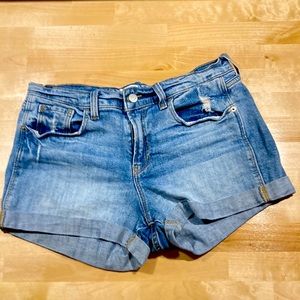 Mildly distressed boyfriend shorts.